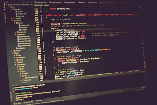 A computer screen displaying lines of code in a development environment. The code includes PHP syntax with functions, variables, and comments. The background is dark, and there are several open tabs with file names on the side.