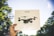 A happy customer holding a drone with Skyforge.rest accessories.