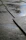 Close-up of clean, wet pavers glistening after a thorough pressure washing session.