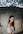 shallow focus photography of woman standing outdoors