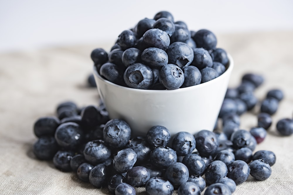 blueberries on white ceramic container