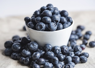 blueberries on white ceramic container