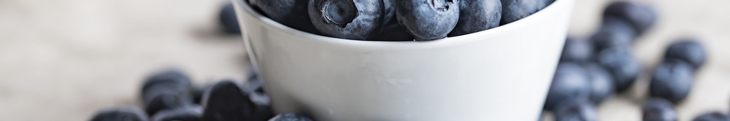 blueberries on white ceramic container