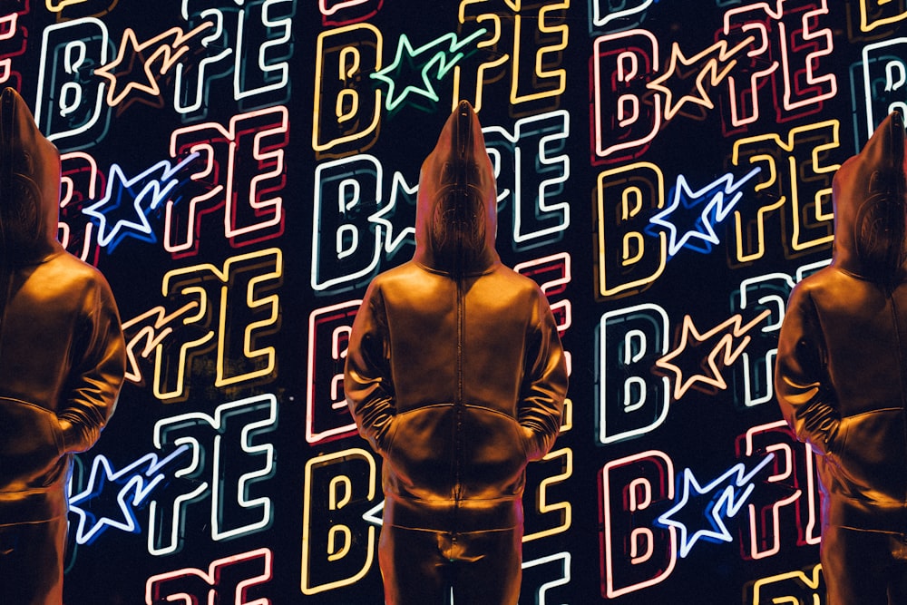 person standing in front of LED light