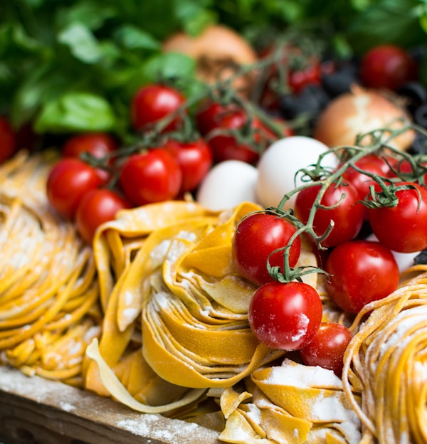 yellow pasta and cherry tomatoes