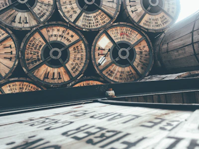 Stack of industrial cable reels with visible certification labels.