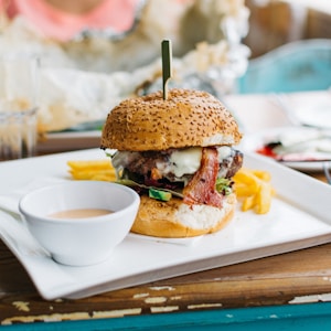 brown burger dish on white ceramic plate