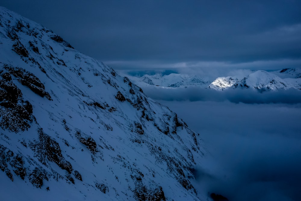 icy mountain during night time