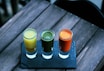 three clear shot glasses