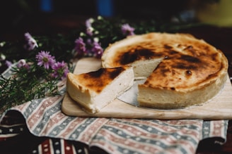pie with one slice cut off on brown wooden tray