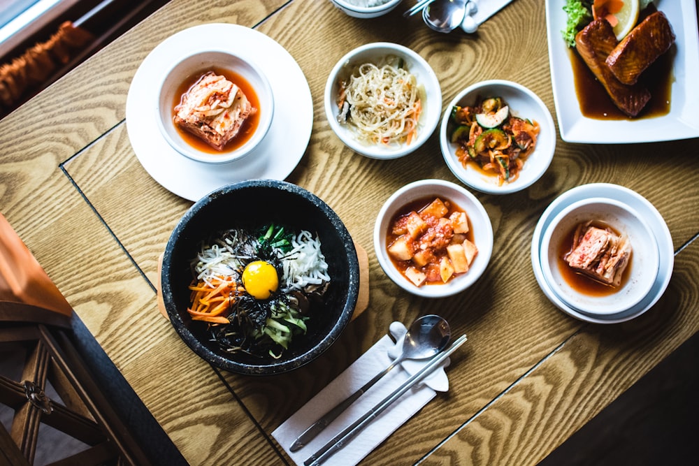 multiple dishes field bowls on table