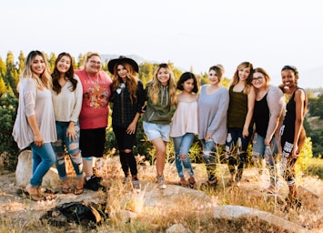 photography poses for big groups,how to photograph girl gang; group of women standing on rock fragment