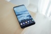A Samsung smartphone on a table.