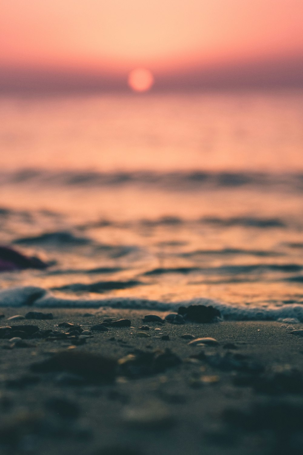 foreground photography of sand near shore