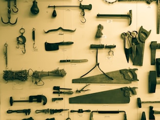 Old kitchen installation tools displayed neatly on a metal shelf.