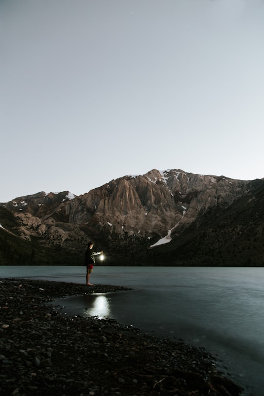 man near body of water in Convict Lake United States
