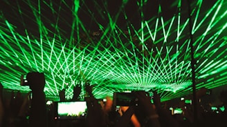 A vibrant image showing a group of friends enjoying online gaming together on their phones with the laser247 logo visible.