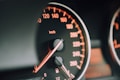 closeup photo of black analog speedometer