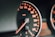 closeup photo of black analog speedometer