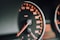 closeup photo of black analog speedometer