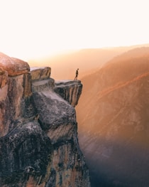 person standing near cliff