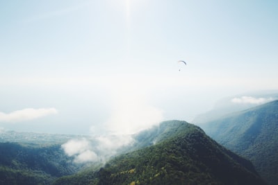 mountain covered by clouds courageous teams background