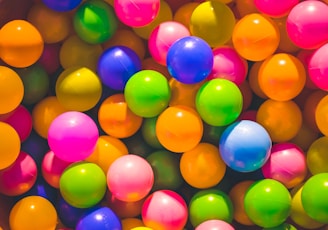 high angle photo of assorted-color plastic balls