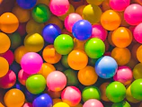 high angle photo of assorted-color plastic balls
