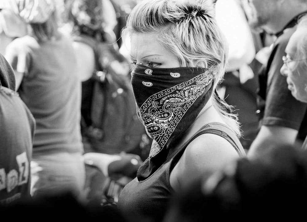 grayscale photo of woman wearing handkerchief