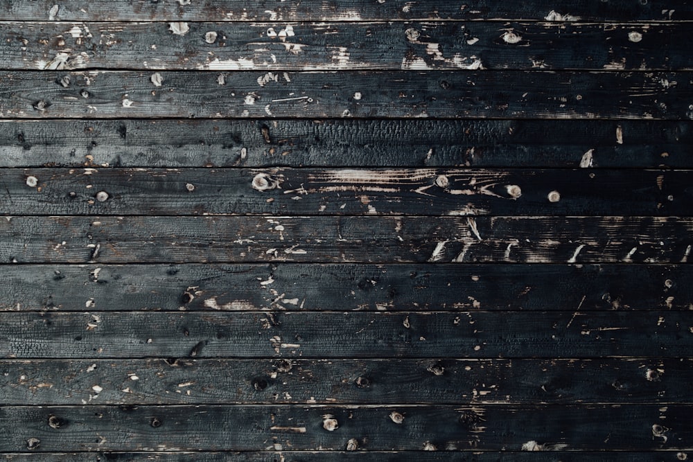 closeup photography of black wooden parquet partition
