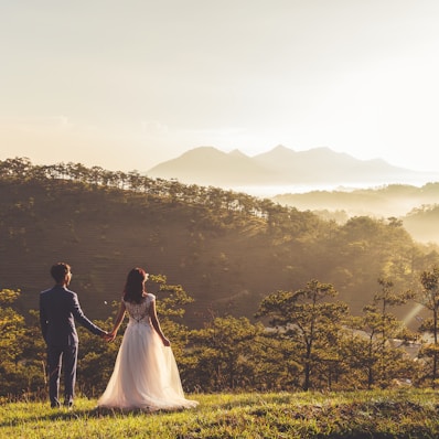 man and woman holding there hands