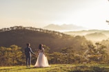 Couple enjoying a sunset view over Sintra’s lush hills bathed in soft gold.