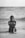 grayscale photo of woman on seashore