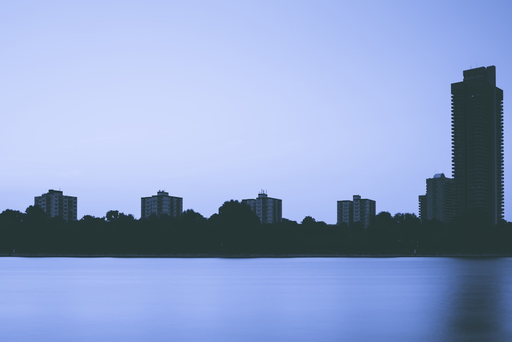 silhouette of city during daytime