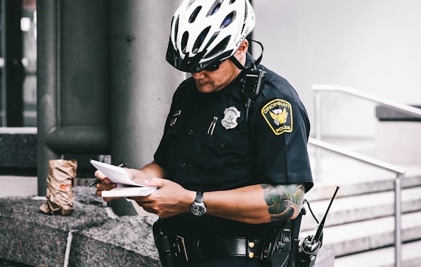 officer reading notes