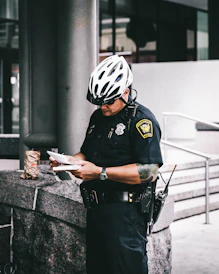 officer reading notes