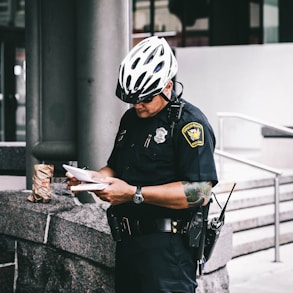 officer reading notes