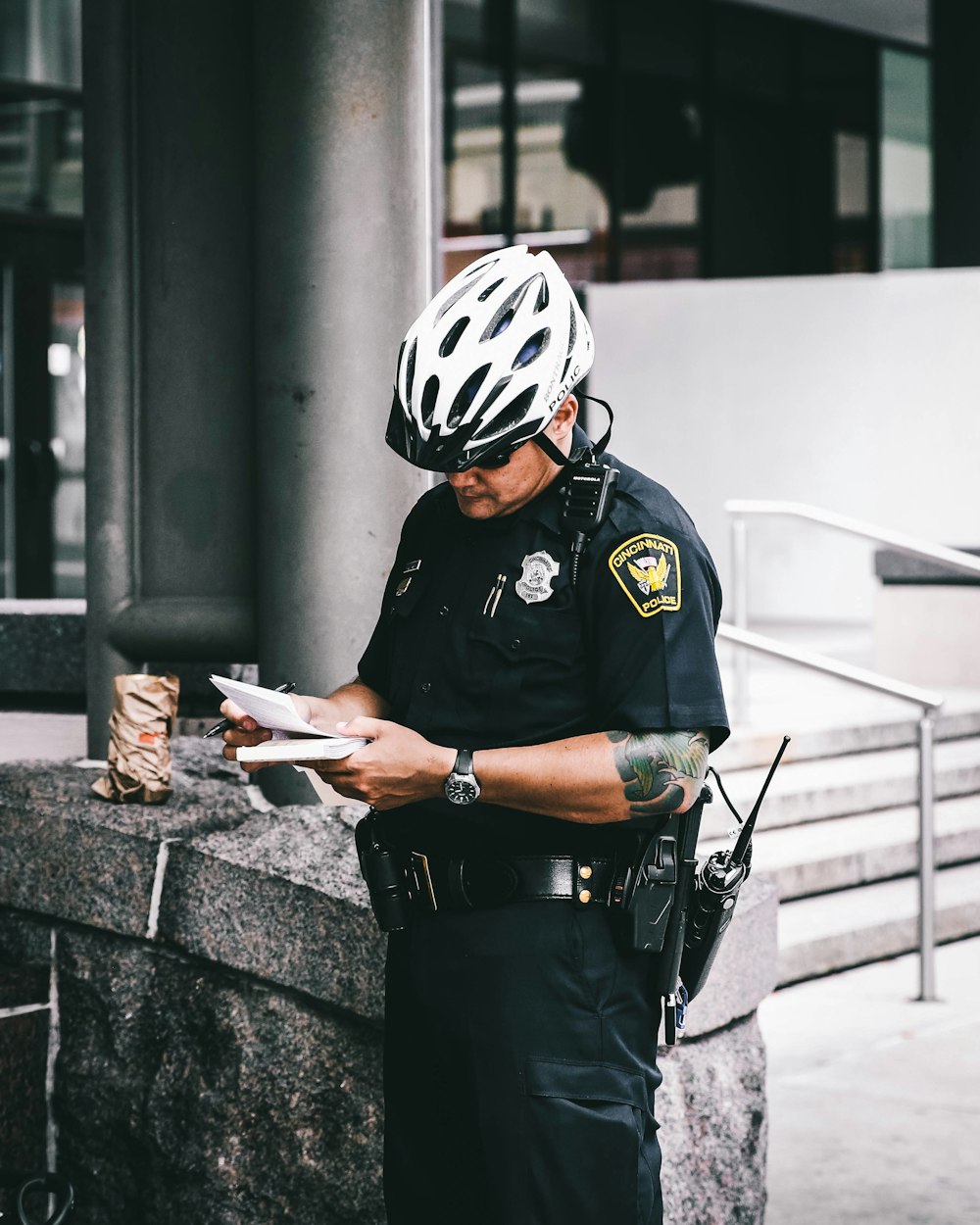 officer reading notes