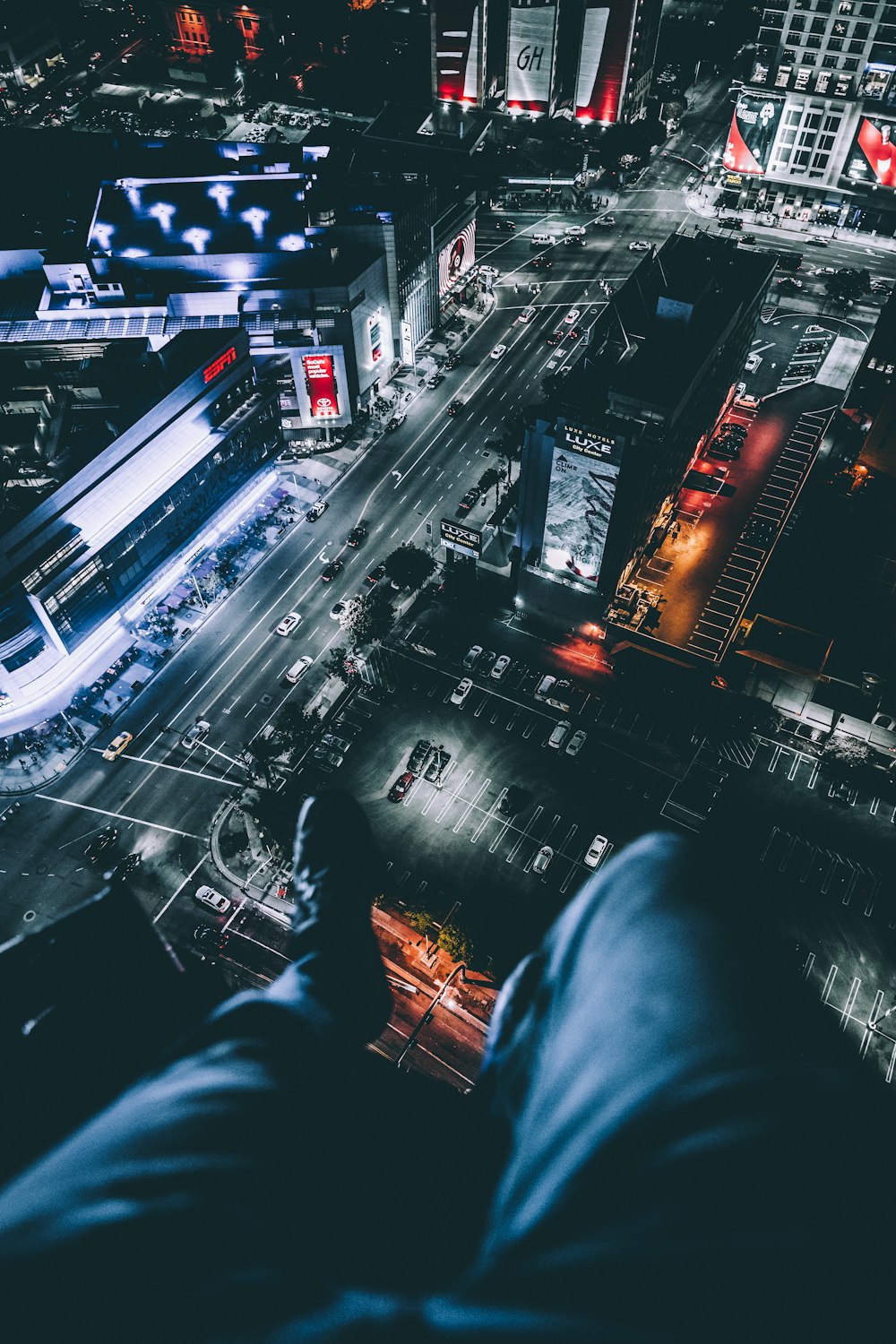 person sitting on top of building