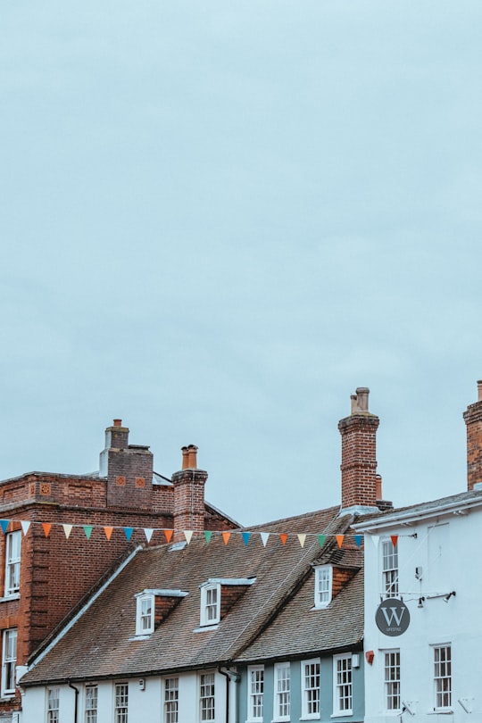 brown and white building at daytime in Lymington United Kingdom