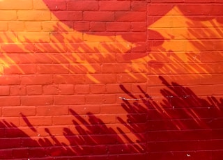 red and orange painted brick wall