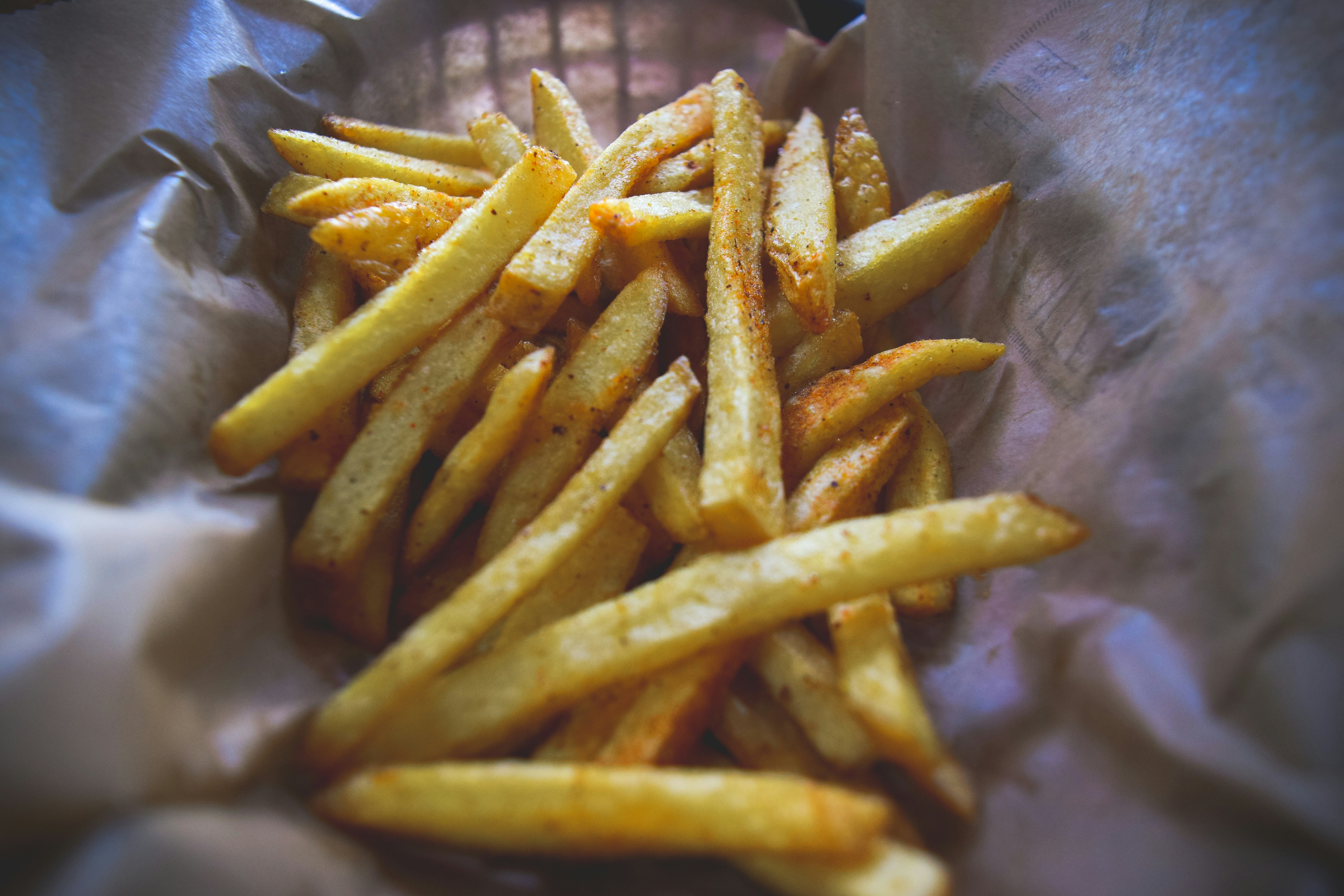 Chilli Garlic Fries — Spicy chilli garlic seasoned fries, Indian café food photography with warm colours and appetising presentation