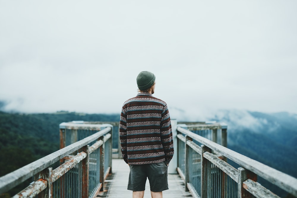 man standing on dock