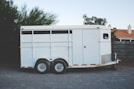 white enclosed vehicle trailer
