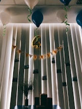 A family celebrating a milestone with everfête décor.