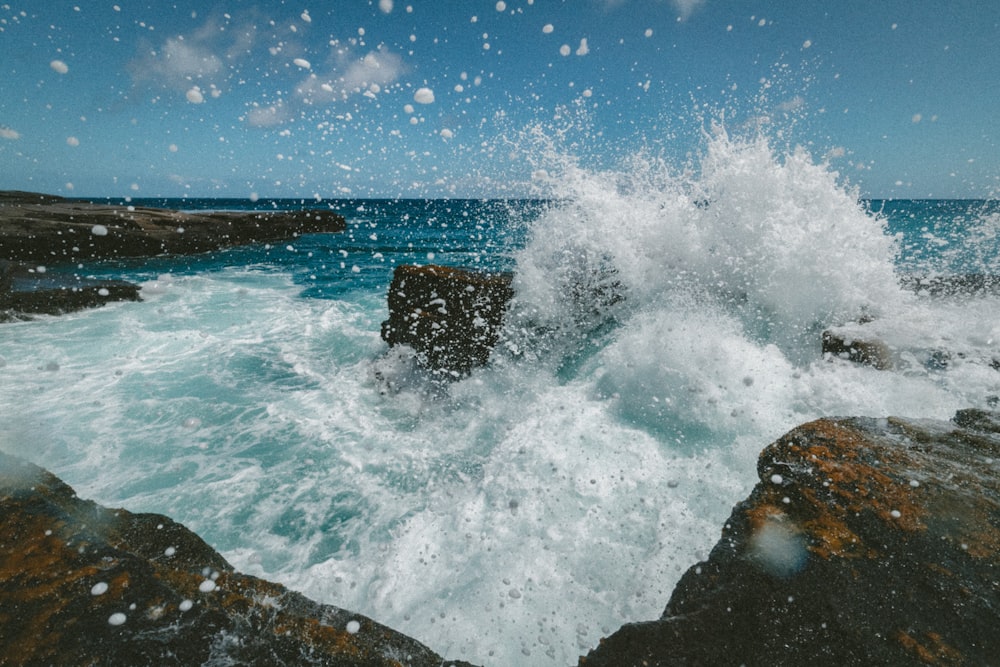Premium Photo  Sea with waves and foam rocks landscape