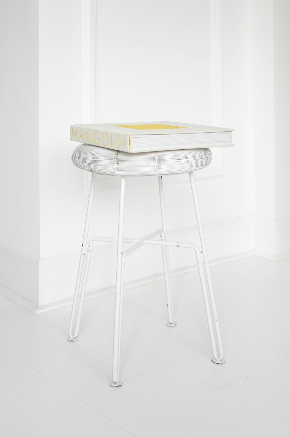 Mangold box on white stool