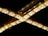 Two LED light strips arranged in a crisscross pattern against a dark background. The strips emit a warm yellowish glow and show detailed circuitry and components.