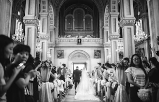 A serene wedding ceremony set in a beautifully decorated church.