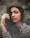 woman in white and black striped pullover top covered with smoke
